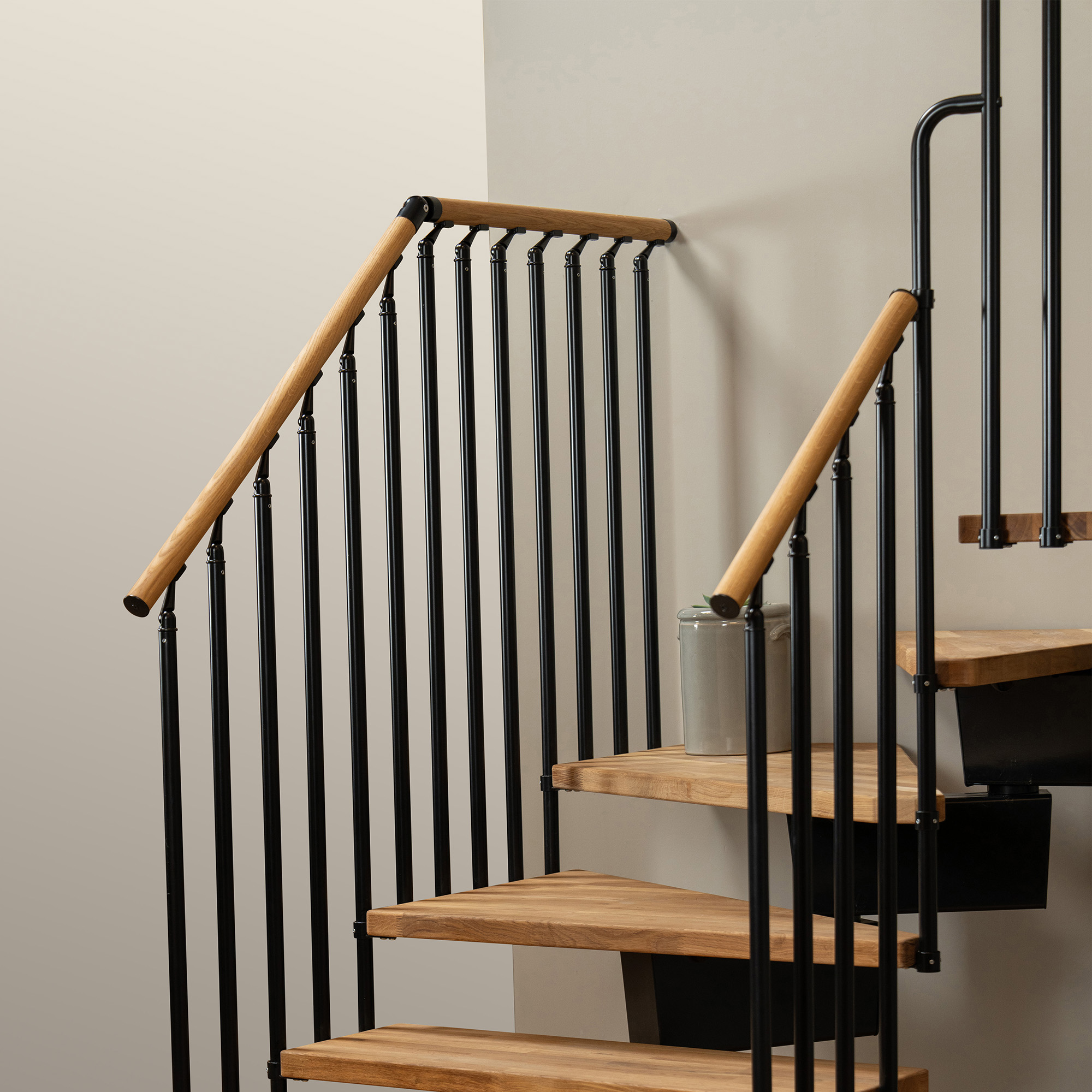 White landing banister at stairway with white staircase