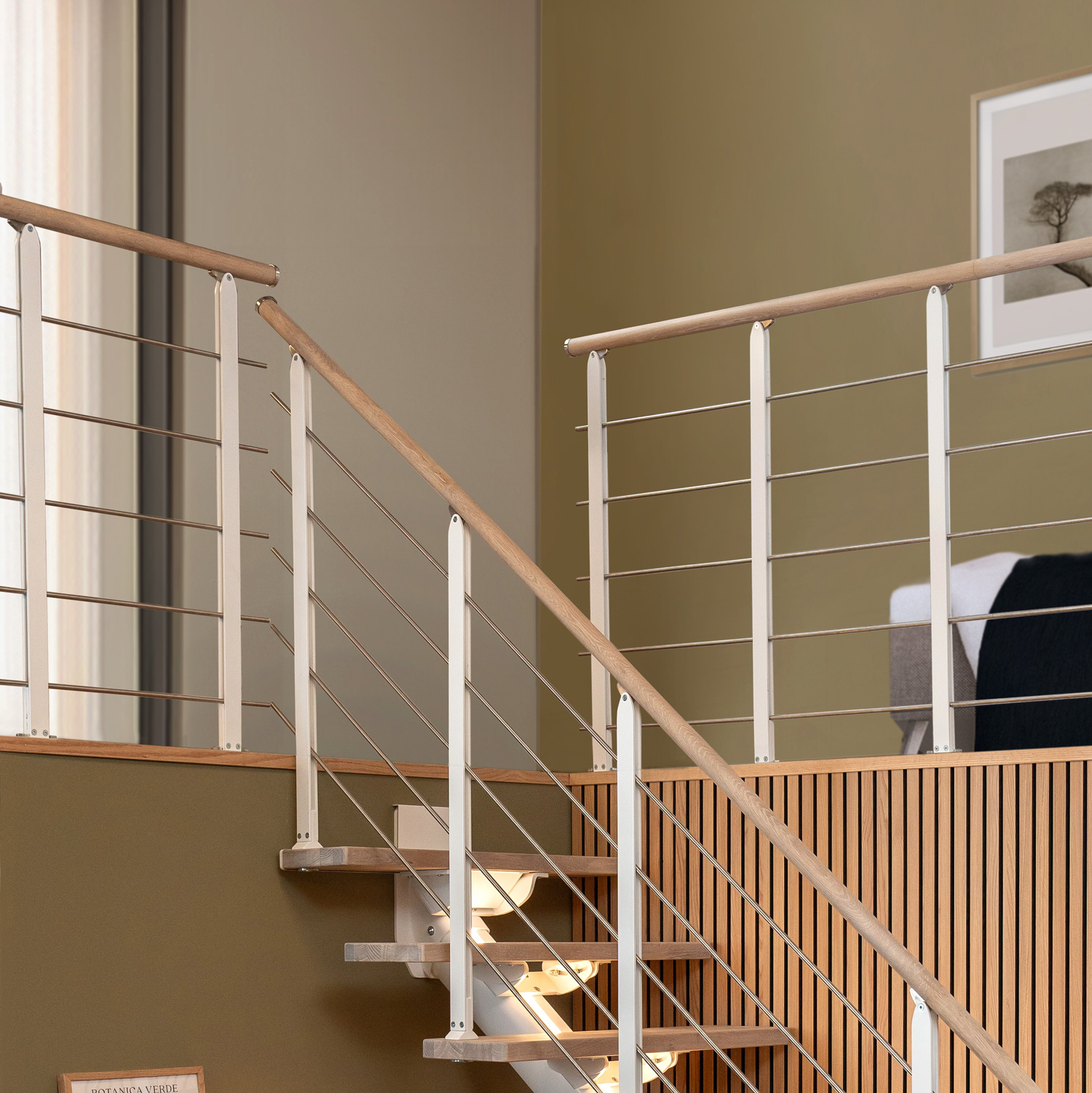 White landing banister at stairway with white staircase